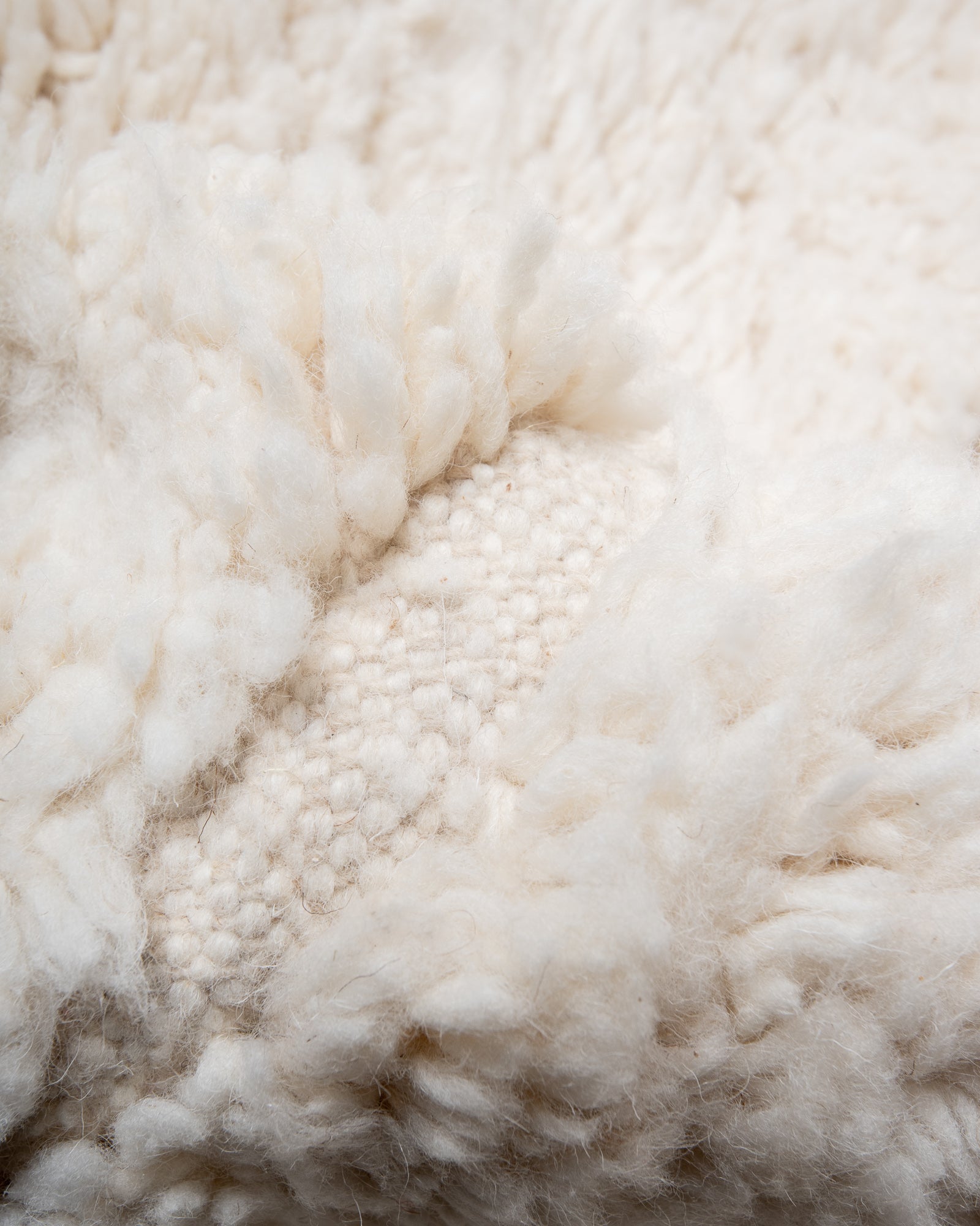 Modern, designer, handcrafted Berber rug from Morocco. Beniourain carpet with beautiful colours and patterns and fluffy wool texture.